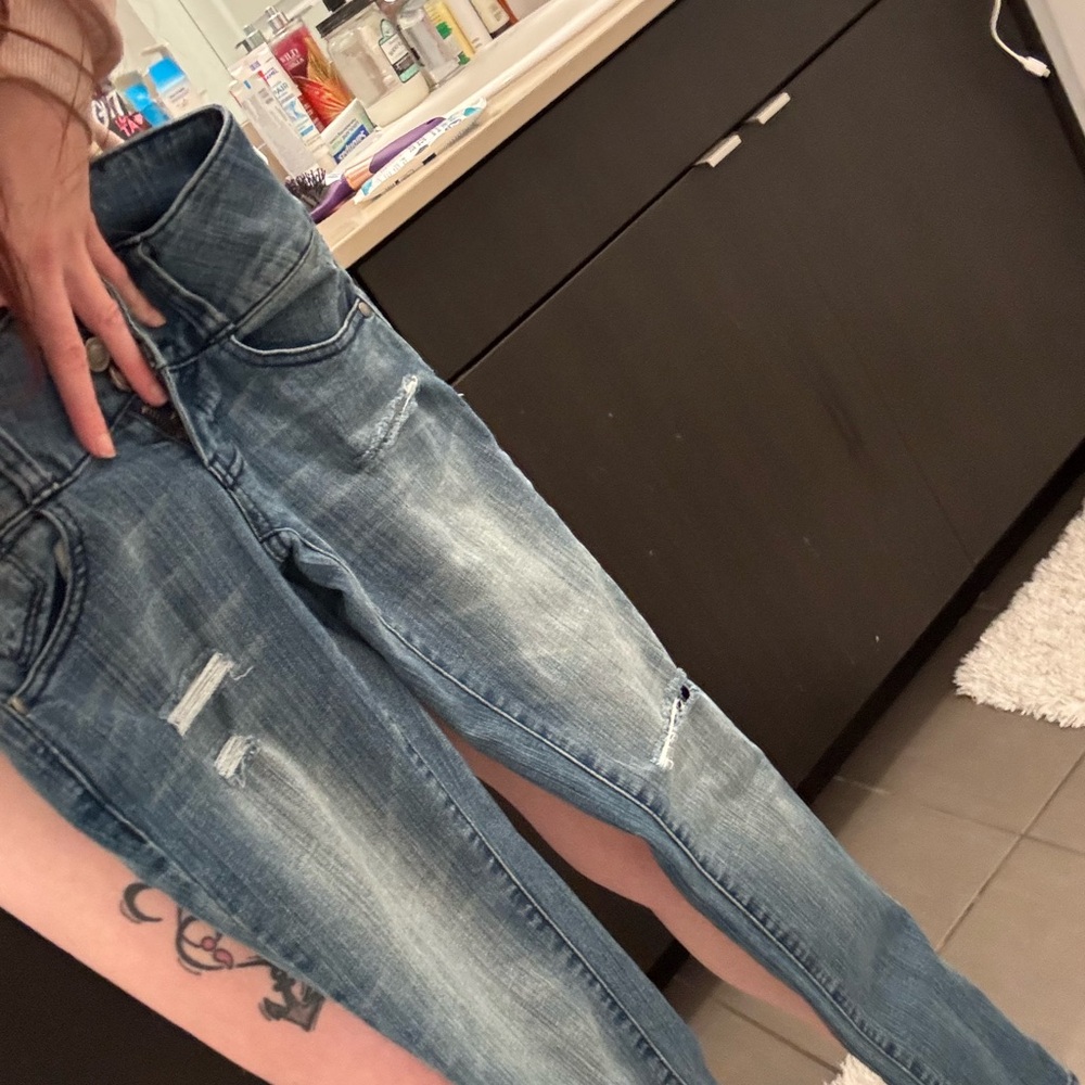 Distressed Blue Jeans